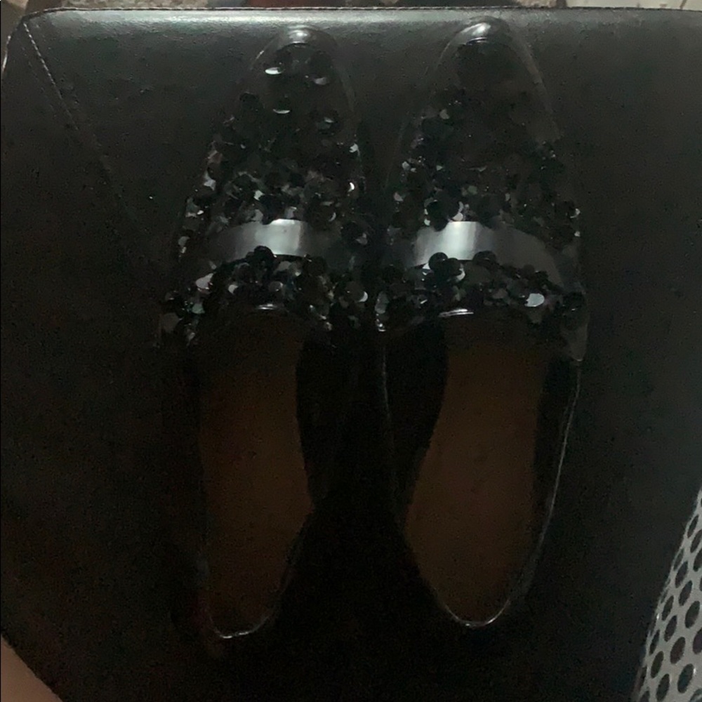 Black floral loafers